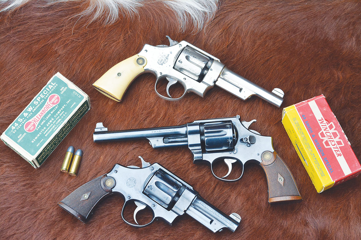 Examples of the first Smith & Wesson N-frame known as the 1st Model Hand Ejector or Triple Lock 44 Special (top to bottom): a rare 5-inch barrel nickel plated with factory ivory stocks, a scarce 61⁄2-inch barrel Target Model and an extremely rare 4-inch barrel variant.